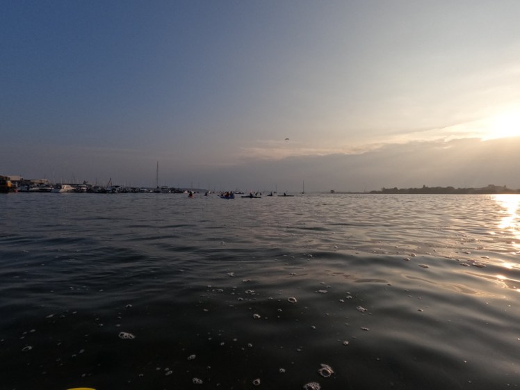 The boat club girls silhouetted against an evening sky. I thought they were closer than they actually were - or the GoPro thought they were further away than they are.
